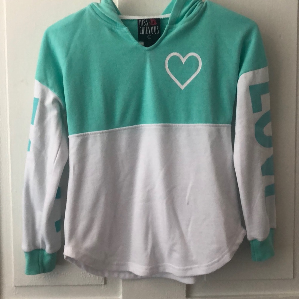 White and teal hooded shirt